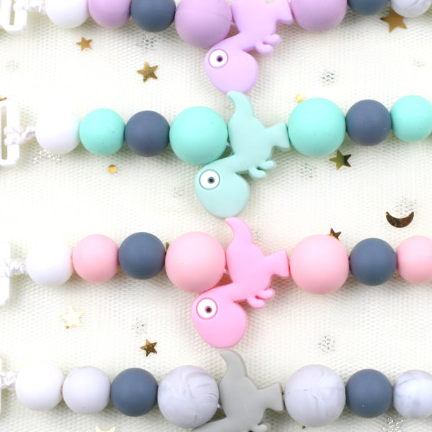 Portable baby nipple chain clip teether toy designed for travel and on-the-go use.